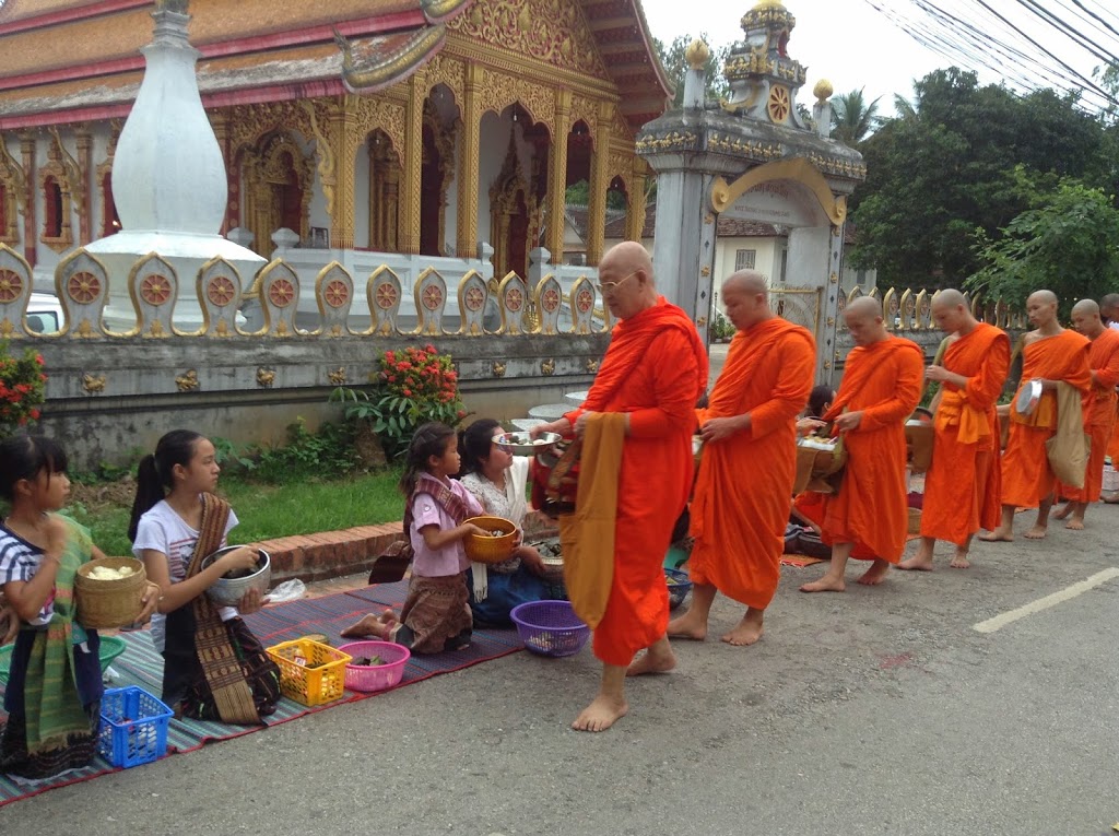 Orange and Saffron robed neighbors ~ Luang Prabang, Laos